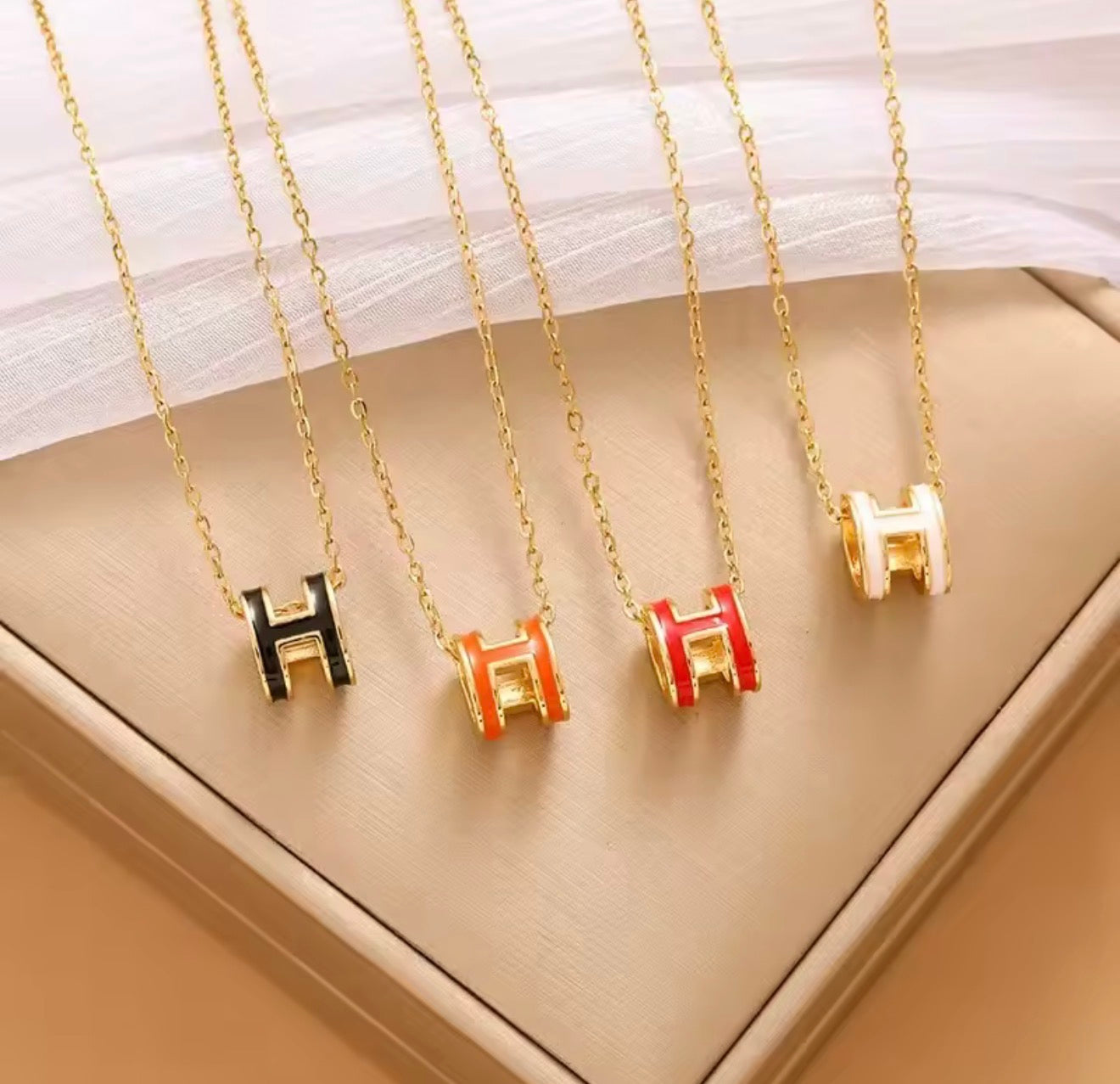 H earring and necklace sets